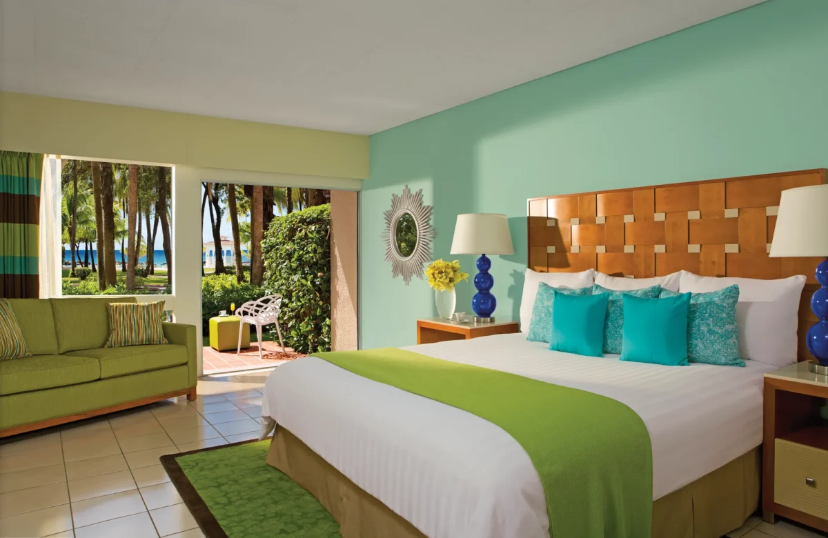 Deluxe Garden View king room with private terrace at Sunscape Curaçao Resort, Spa & Casino.