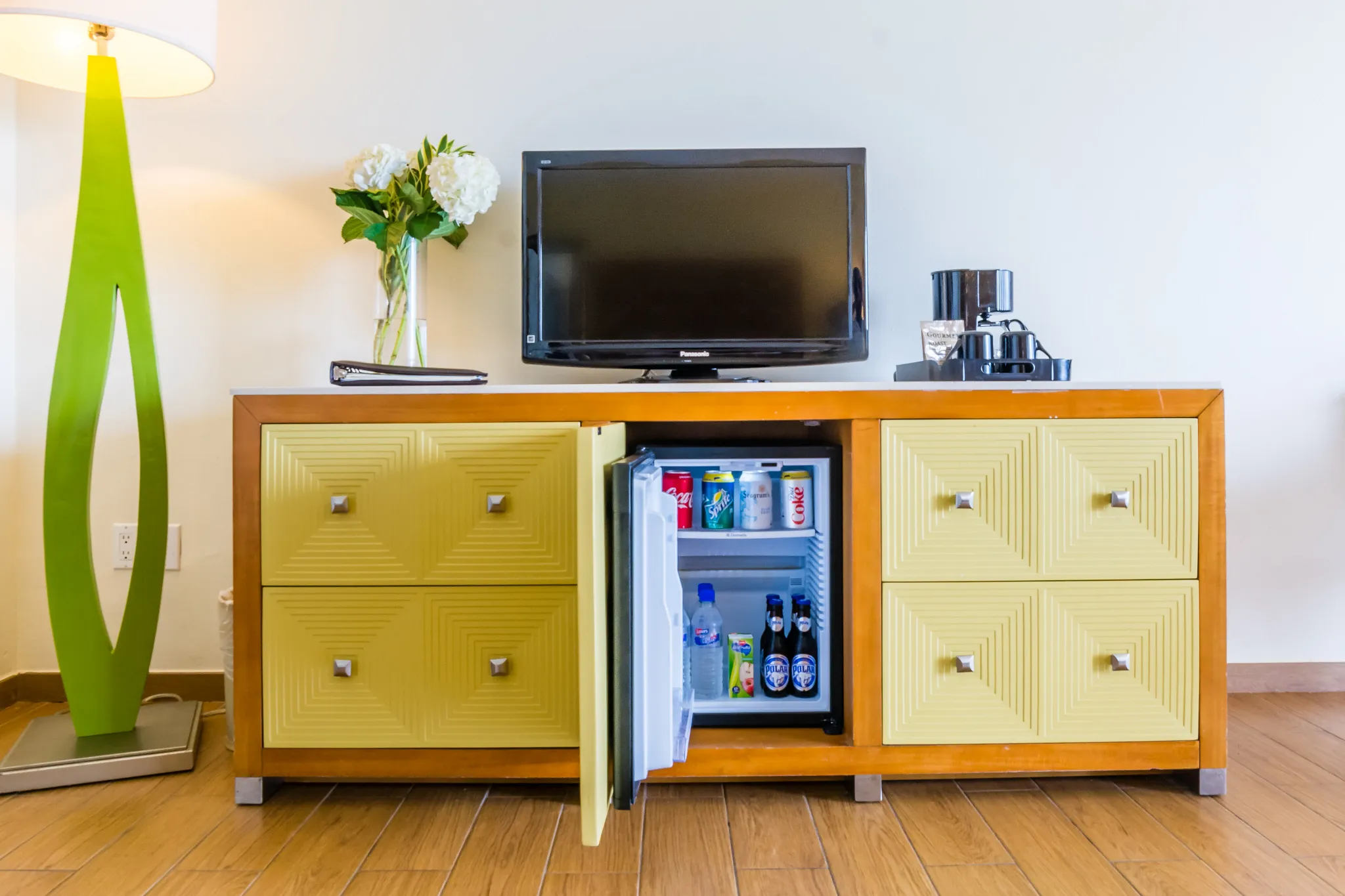 Sun Club Deluxe Ocean View room with two double beds and oceanfront balcony at Sunscape Curaçao Resort.