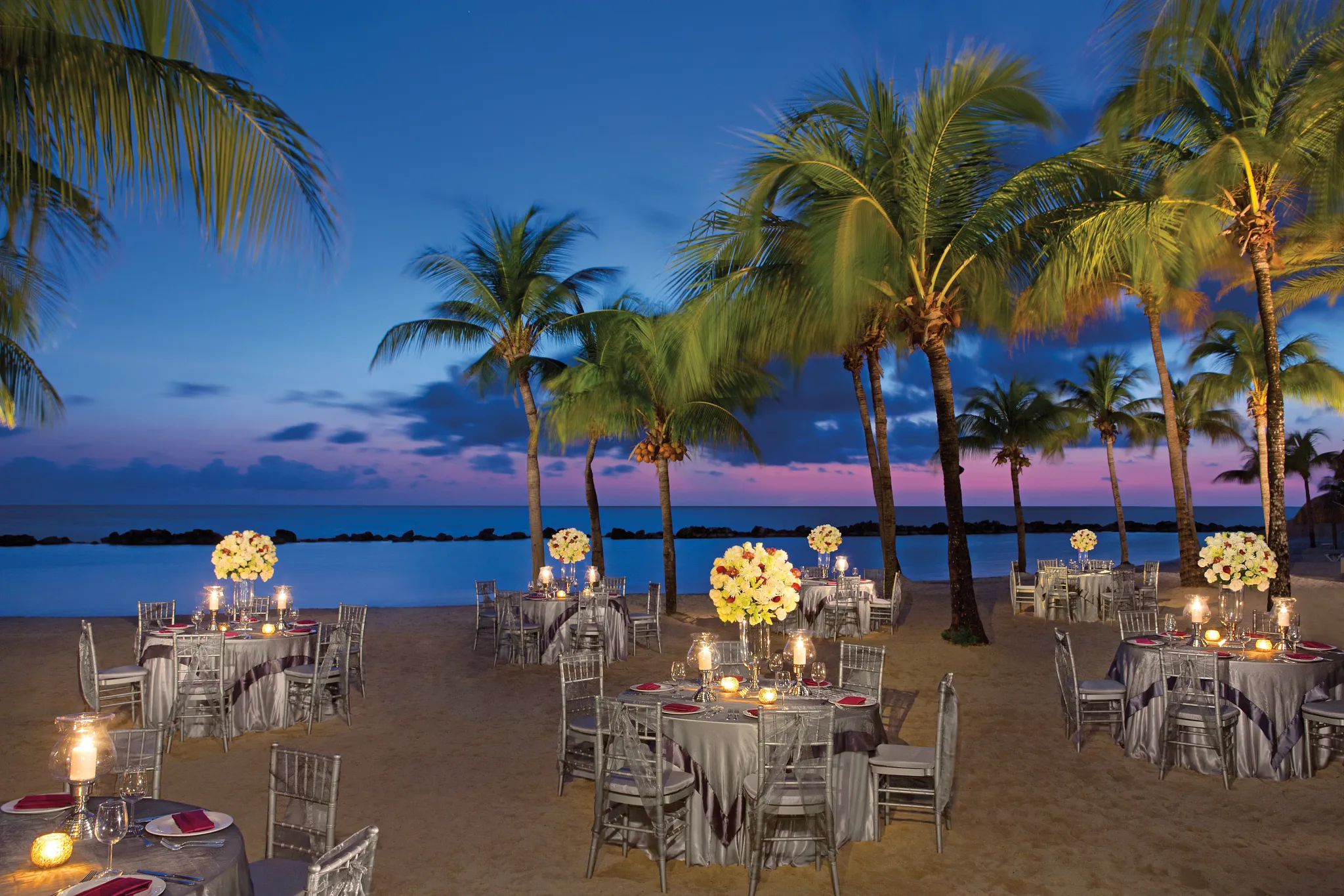 Beachfront gala dinner wedding reception setup at Sunscape Curaçao Resort, Spa & Casino