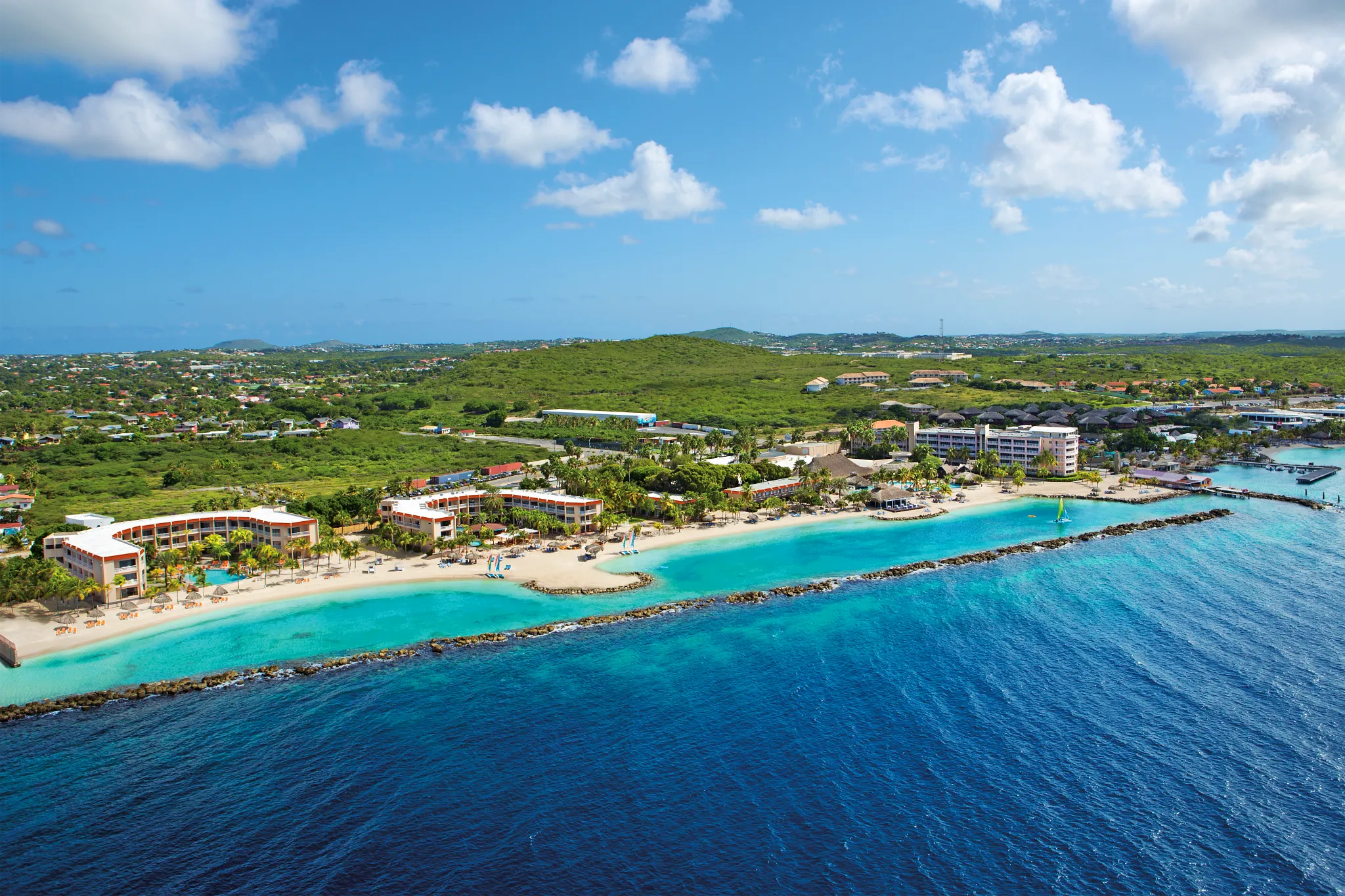 Aerial view of Sunscape Curaçao Resort, Spa & Casino along the Caribbean coastline.